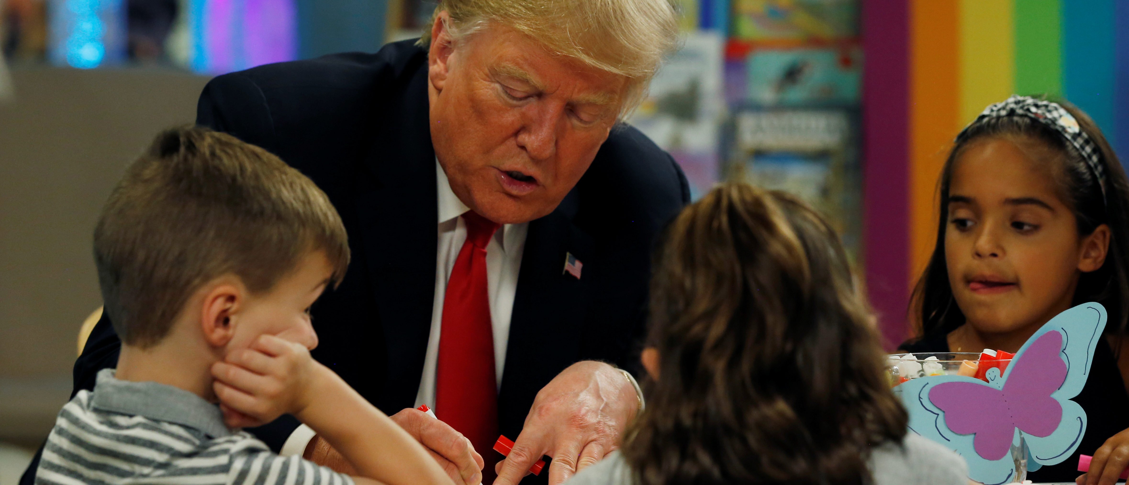 President Trump Colors A Flag At A Children’s Hospital — And All