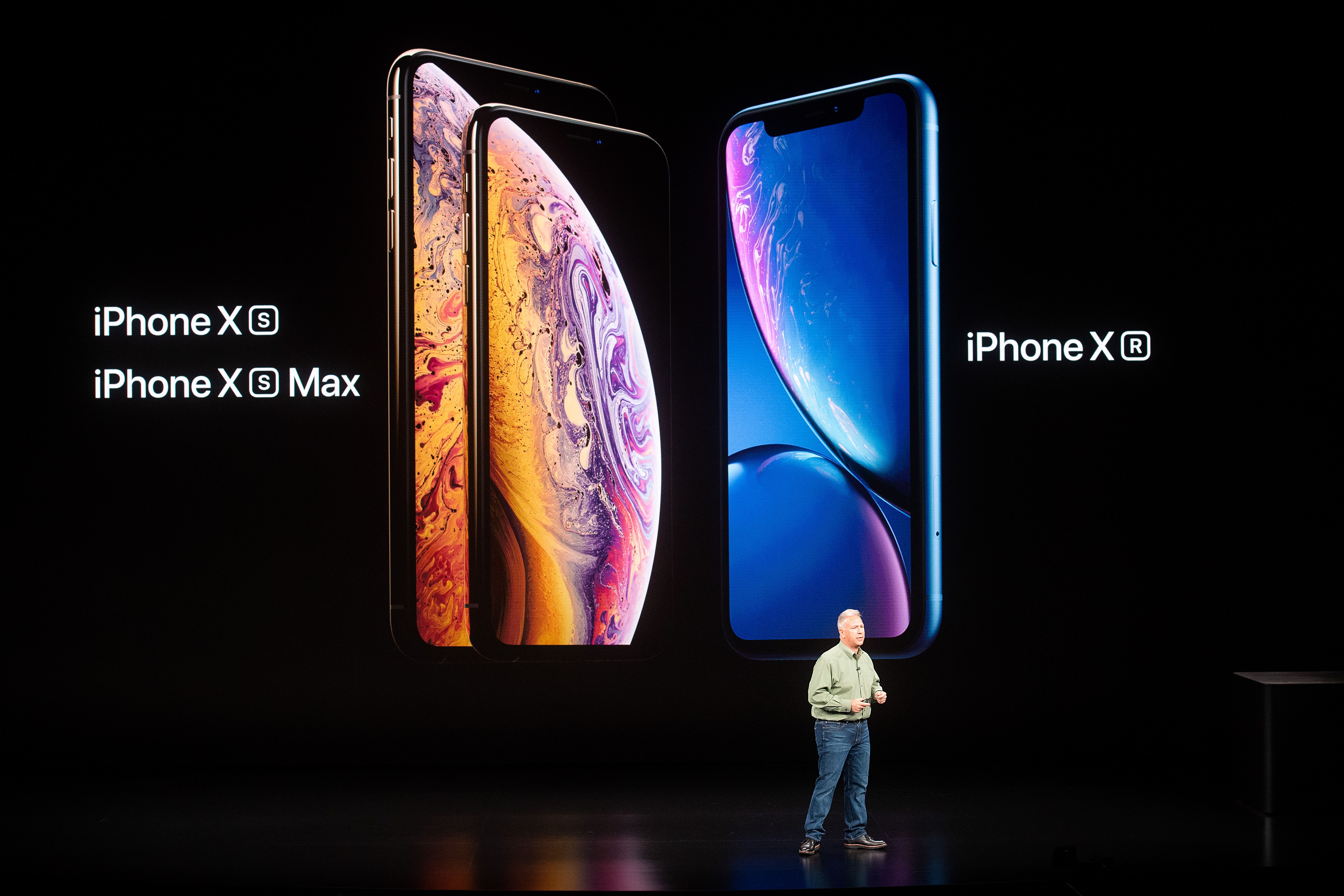 New iPhones set to be unveiled Wednesday offer Apple a chance for fresh momentum in a sputtering smartphone market as the California tech giant moves into new products and services to diversify. NOAH BERGER/AFP/Getty Images