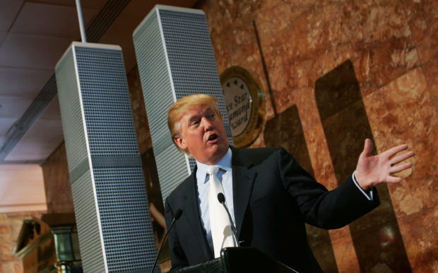 NEW YORK - MAY 18: Real estate developer Donald Trump speaks during a news conference presenting a model of a proposed design for the rebuilding of the World Trade Center site May 18, 2005 in New York City. Trump proposed a modified rebuilding of the World Trade Center complex, with an updated and taller design and a memorial to those killed in the 9/11 terrorist attacks at the base of the new towers. (Photo by Chris Hondros/Getty Images)