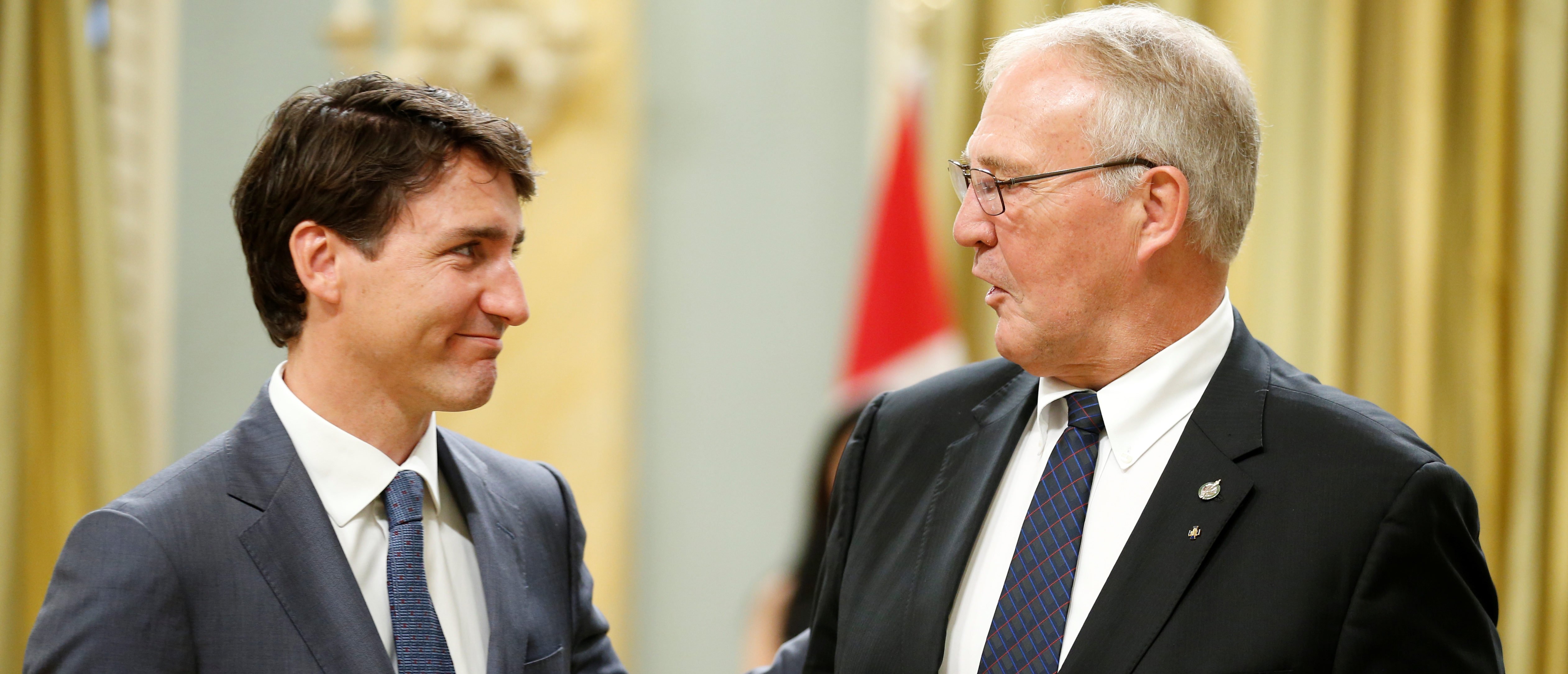 Canada's Prime Minister Justin Trudeau congratulates Bill Blair after he was sworn-in as Minister of Border Security and Organized Crime Reduction during a cabinet shuffle at Rideau Hall in Ottawa, Ontario, Canada, July 18, 2018. REUTERS/Chris Wattie