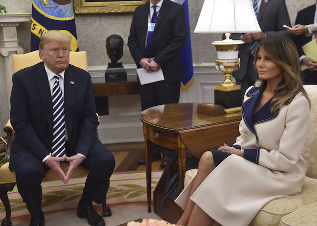 US President Donald Trump speaks to the media with Polish President Andrzej Duda in the Oval office at the White House on September 18, 2018 in Washington,DC as First Lady Melania Trump looks on. (Photo credit: NICHOLAS KAMM/AFP/Getty Images)
