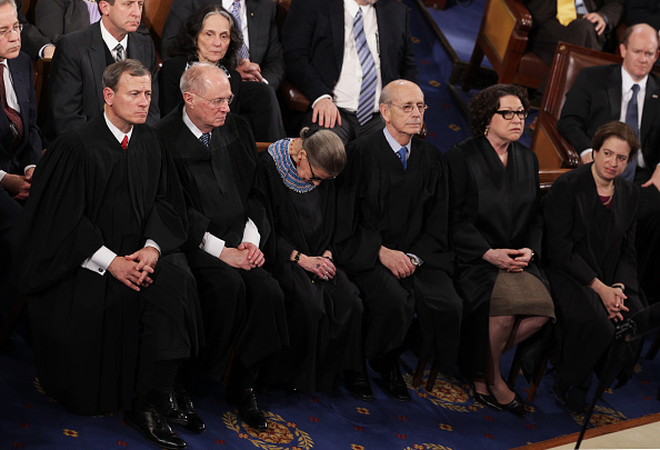 WASHINGTON, DC - JANUARY 20: (L-R) U.S. Supreme Court Chief Justice John Roberts, with Justices, Anthony Kennedy, Ruth Bader Ginsburg, Stephen Breyer, Sonia Sotomayor and Elena Kagan listen as U.S. President Barack Obama delivers his State of the Union speech before members of Congress in the House chamber of the U.S. Capitol on January 20, 2015 in Washington, DC. Obama presented a broad agenda including attempts to address income inequality and making it easier for Americans to afford college education and child care. (Photo by Alex Wong/Getty Images)