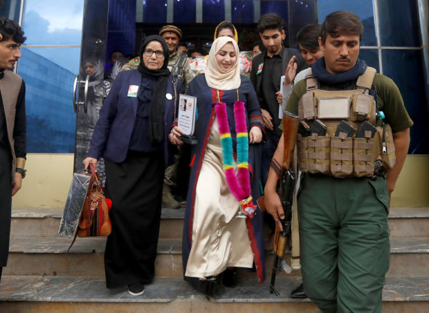 Female Afghan parliamentary election candidate, Suhaila Sahar, leaves her office during an election campaign in Kabul, Afghanistan October 8, 2018. Picture taken October 8, 2018. REUTERS/Omar Sobhani