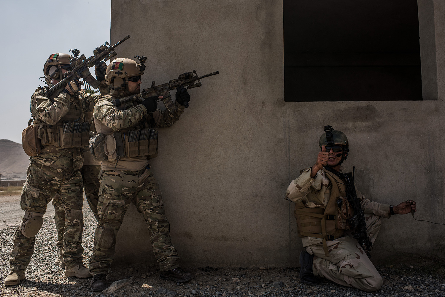 Members of Afghanistan's Crisis Response Unit 222, an Afghan Special Police Unit, participate in a training slowed down for the media on September 7, 2017 at Camp Lion in Kabul, Afghanistan. Currently the United States has about 11,000 troops in the deployed in Afghanistan, with a reported 4,000 more expected to arrive in the coming weeks. With the arrival of more troops, Resolute Support, the coalition train, advise, and assist mission, hopes to train almost double the amount of Afghan Special Forces and Special Police Units. (Photo by Andrew Renneisen/Getty Images)