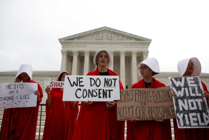 Protesters demonstrate on first day with newly sworn in Associate Justice Brett Kavanaugh on the court at the Supreme Court in Washington, U.S., October 9, 2018. REUTERS/Joshua Roberts
