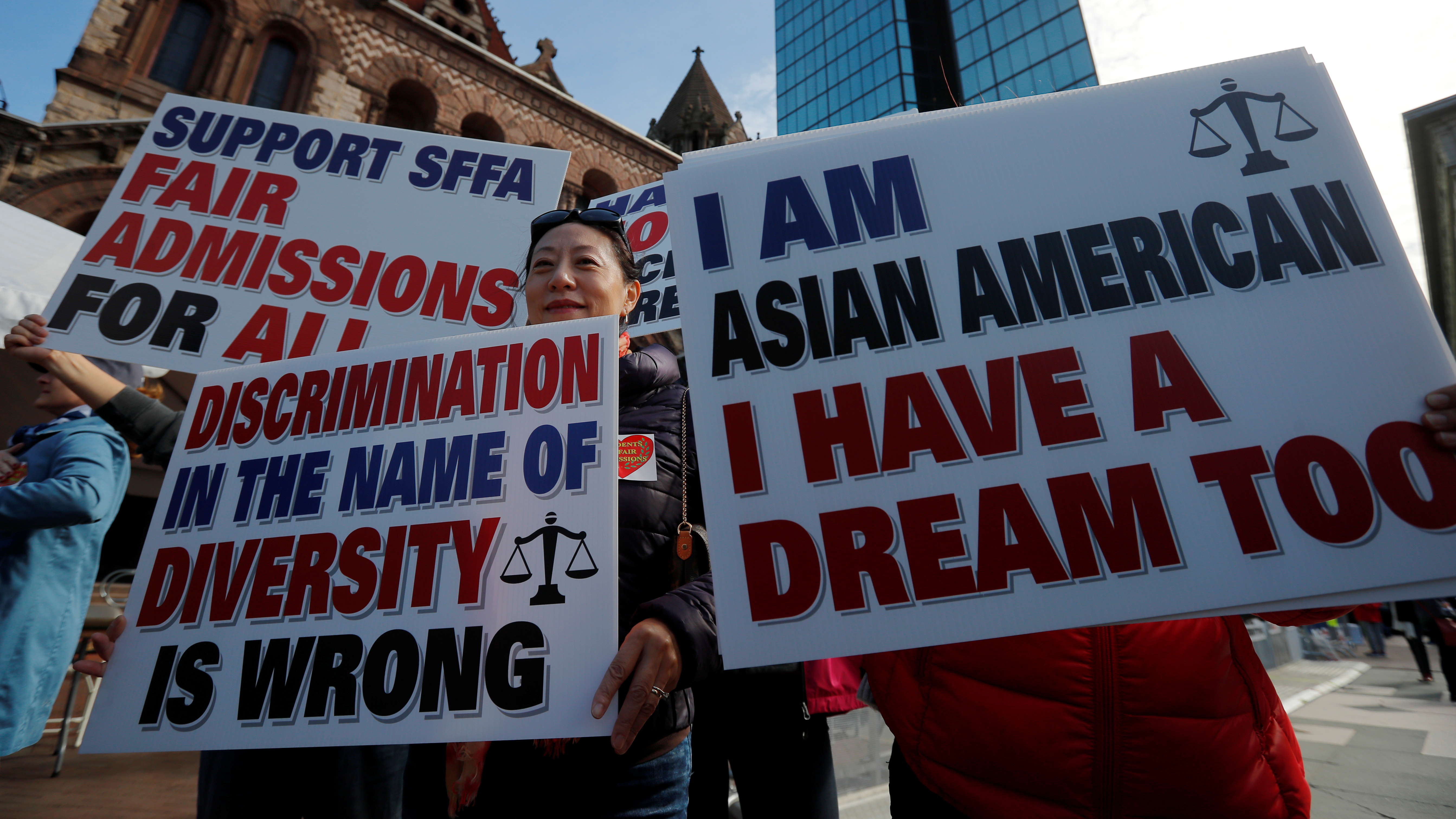 Supporters attend the "Rally for the American Dream - Equal Education Rights for All," ahead of the start of the trial in a lawsuit accusing Harvard University of discriminating against Asian-American applicants, in Boston, Massachusetts, U.S., October 14, 2018. REUTERS/Brian Snyder