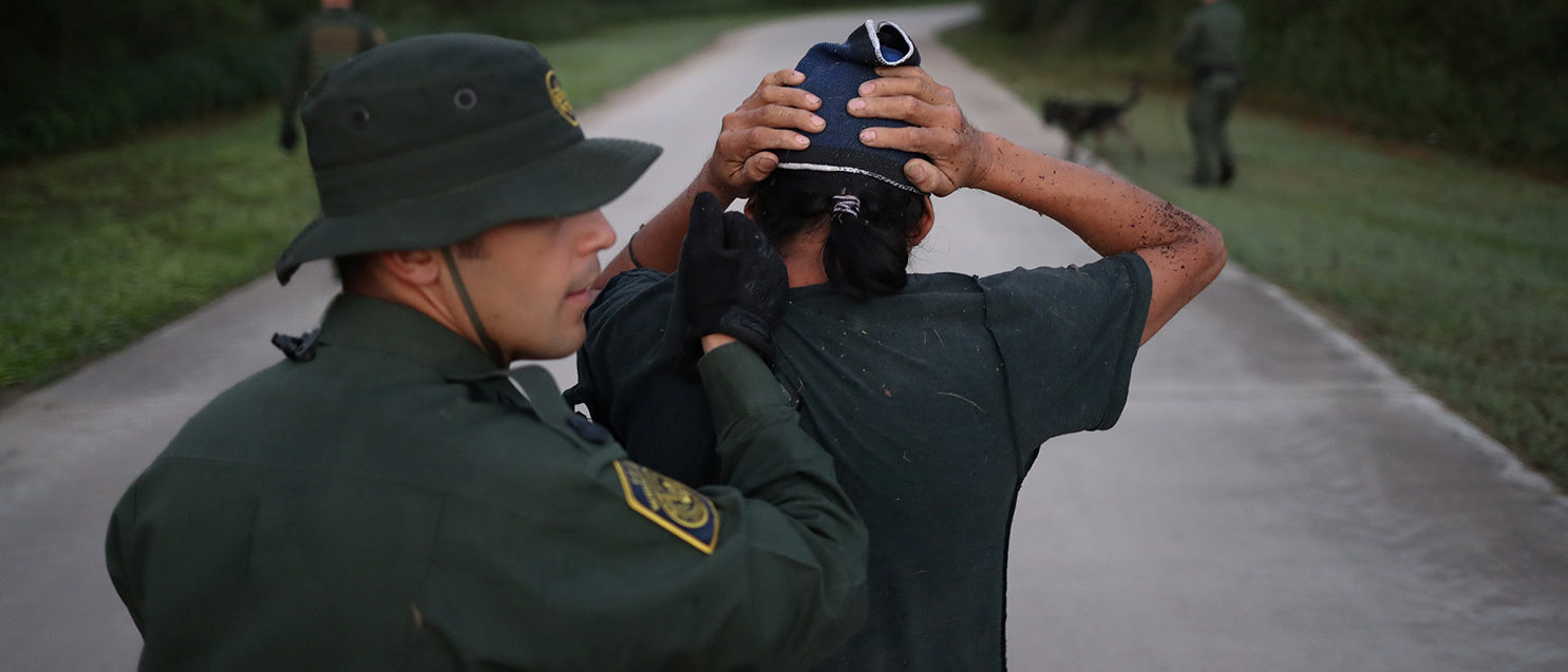 U.S. Border Patrol Agent Robert Rodriguez apprehends a man from Mexico for illegally crossing into the United States from Mexico in Penitas, Texas, U.S., October 5, 2018. Picture taken October 5, 2018. REUTERS/Adrees Latif