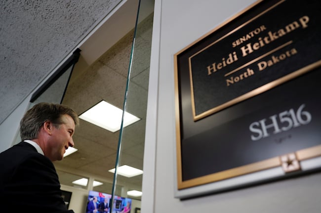 U.S. Supreme Court nominee Judge Brett Kavanaugh arrives for a meeting with Senator Heidi Heitkamp on Capitol Hill in Washington D.C., August 15, 2018. REUTERS/Carlos Barria