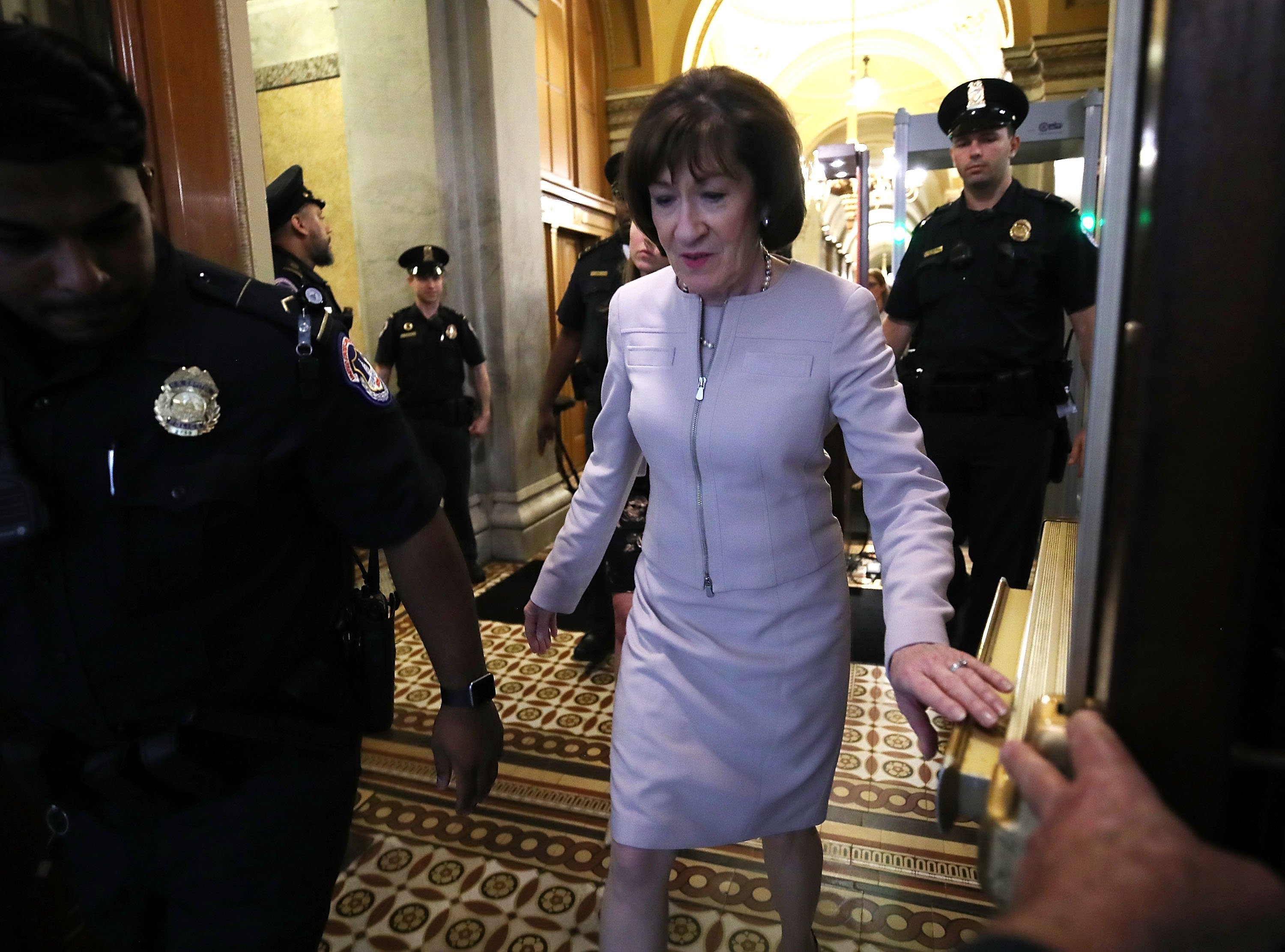 WASHINGTON, DC - OCTOBER 05: Sen. Susan Collins (R-ME) walks out of the carriage entrance of the U.S. Capitol after announcing that she would vote yes on the nomination of Supreme Court Judge Brett Kavanaugh to the U.S. Supreme Court, at the U.S. Capitol, October 5, 2018 in Washington, DC. The Senate voted 51-49 in a procedural vote to advance the nomination of Judge Brett Kavanaugh to the U.S. Supreme Court. (Photo by Mark Wilson/Getty Images)
