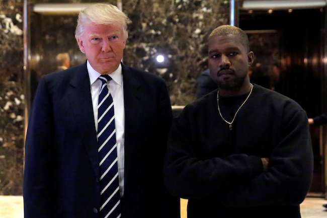 FILE -- President-elect Donald Trump and musician Kanye West pose for media at Trump Tower in Manhattan, New York City, December 13, 2016. REUTERS/Andrew Kelly