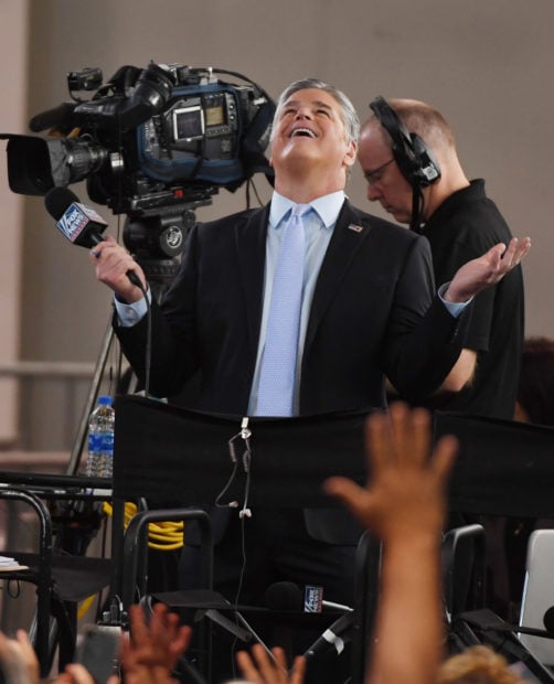 LAS VEGAS, NV - SEPTEMBER 20: Fox News Channel and radio talk show host Sean Hannity reacts to attendees before a Donald Trump campaign rally at the Las Vegas Convention Center on September 20, 2018 in Las Vegas, Nevada. Trump is in town to support the re-election campaign for U.S. Sen. Dean Heller (R-NV) as well as Nevada Attorney General and Republican gubernatorial candidate Adam Laxalt and candidate for Nevada's 3rd House District Danny Tarkanian and 4th House District Cresent Hardy. (Photo by Ethan Miller/Getty Images)