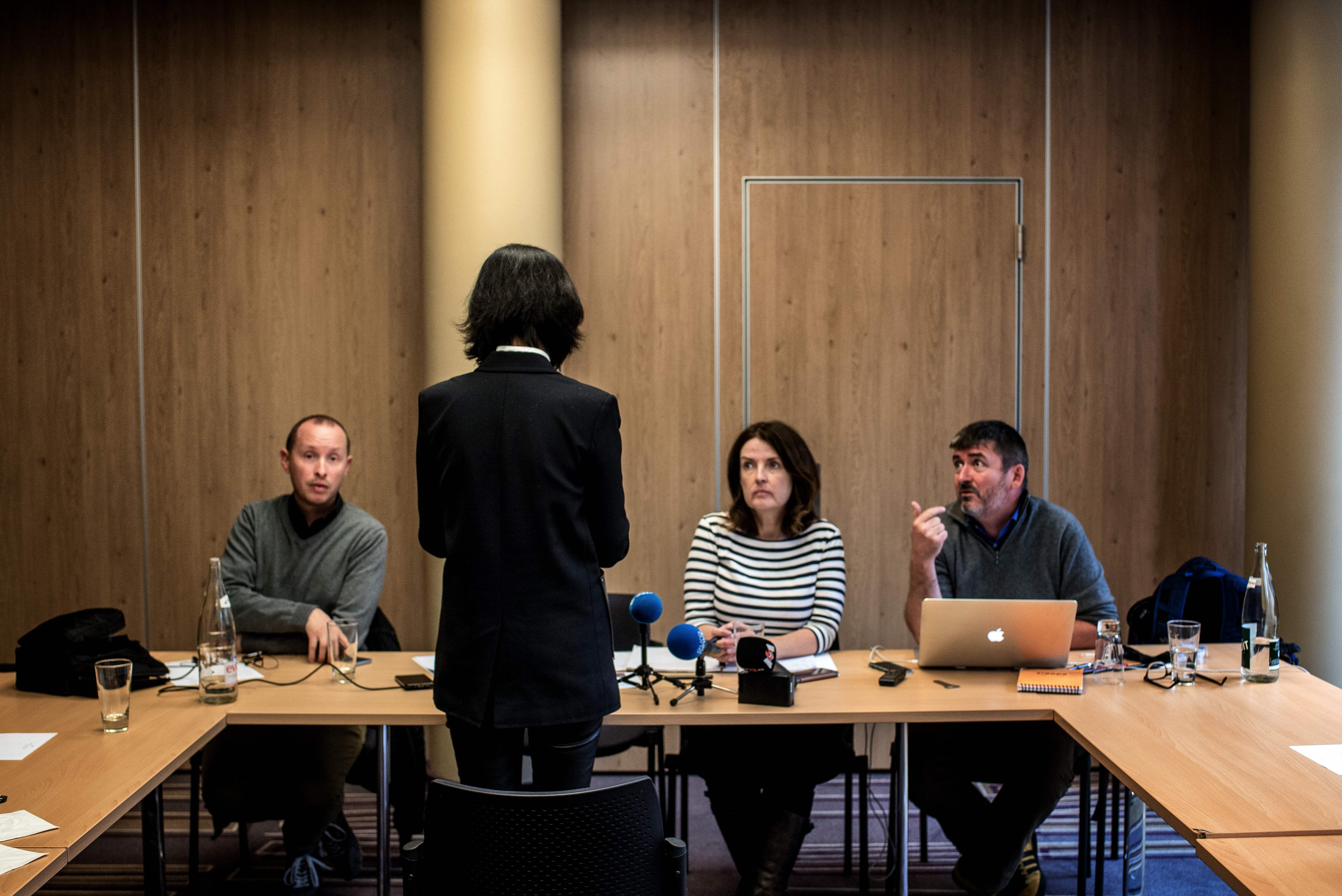 Grace, the wife of the missing Interpol president Meng Hongwey, talks to journalists on October 7, 2018 in Lyon during a press conference during which she did not want her face to be shown, a day after Interpol demanded an official "clarification" from China on the whereabouts of its missing police chief, after reports said he was detained for questioning on arrival in his homeland. - Beijing has remained silent over the mysterious disappearance of Meng Hongwei, who was last seen leaving for China in late September from the Interpol headquarters in Lyon, southeast France, a source close to the enquiry told AFP. (Photo by JEFF PACHOUD / AFP) 