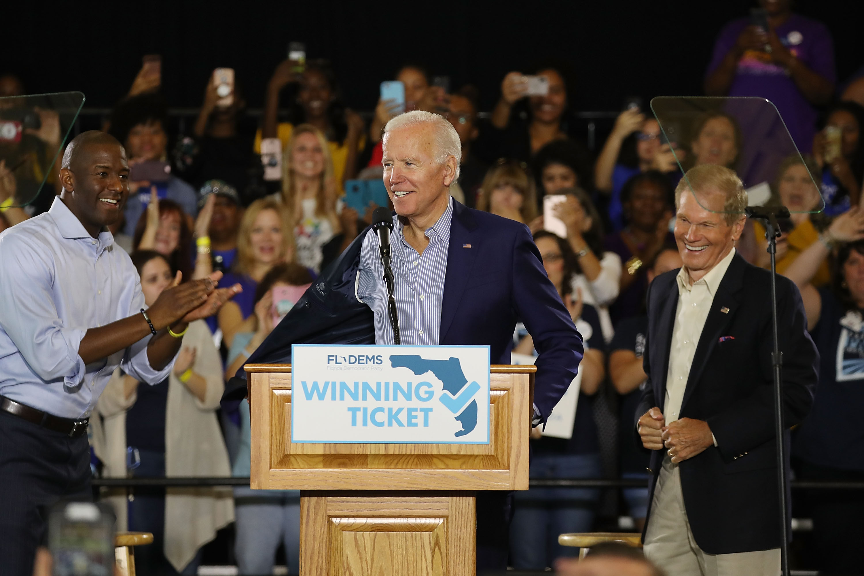 TAMPA, FL - OCTOBER 22: Former Vice President Joe Biden arrives on stage with Florida Democratic gubernatorial nominee Andrew Gillum and U.S. Sen. Bill Nelson (D-FL) during a campaign rally held at the University of South Florida Campus Recreation Building on October 22, 2018 in Tampa, Florida. The rally was held to support U.S. Sen. Bill Nelson (D-FL) and Democratic gubernatorial nominee Andrew Gillum as they run against their Republican opponents. (Photo by Joe Raedle/Getty Images)