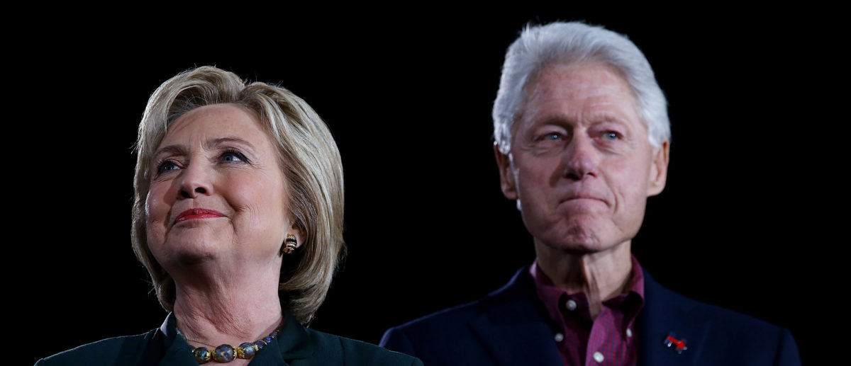 LAS VEGAS, NV - FEBRUARY 19: (L-R) Democratic presidential candidate former Secretary of State Hillary Clinton and her husband, former U.S. president Bill Clinton look on during a "Get Out The Caucus" at the Clark County Government Center on February 19, 2016 in Las Vegas, Nevada. With one day to go before the Democratic caucuses in Nevada, Hillary Clinton is campaigning in Las Vegas. (Photo by Justin Sullivan/Getty Images)LAS VEGAS, NV - FEBRUARY 19: (L-R) Democratic presidential candidate former Secretary of State Hillary Clinton and her husband, former U.S. president Bill Clinton look on during a "Get Out The Caucus" at the Clark County Government Center on February 19, 2016 in Las Vegas, Nevada. With one day to go before the Democratic caucuses in Nevada, Hillary Clinton is campaigning in Las Vegas. (Photo by Justin Sullivan/Getty Images)
