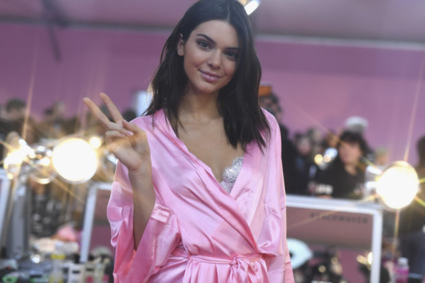 PARIS, FRANCE - NOVEMBER 30: Kendall Jenner poses backstage prior to the Victoria's Secret Fashion Show on November 30, 2016 in Paris, France. (Photo by Pascal Le Segretain/Getty Images for Victoria's Secret)