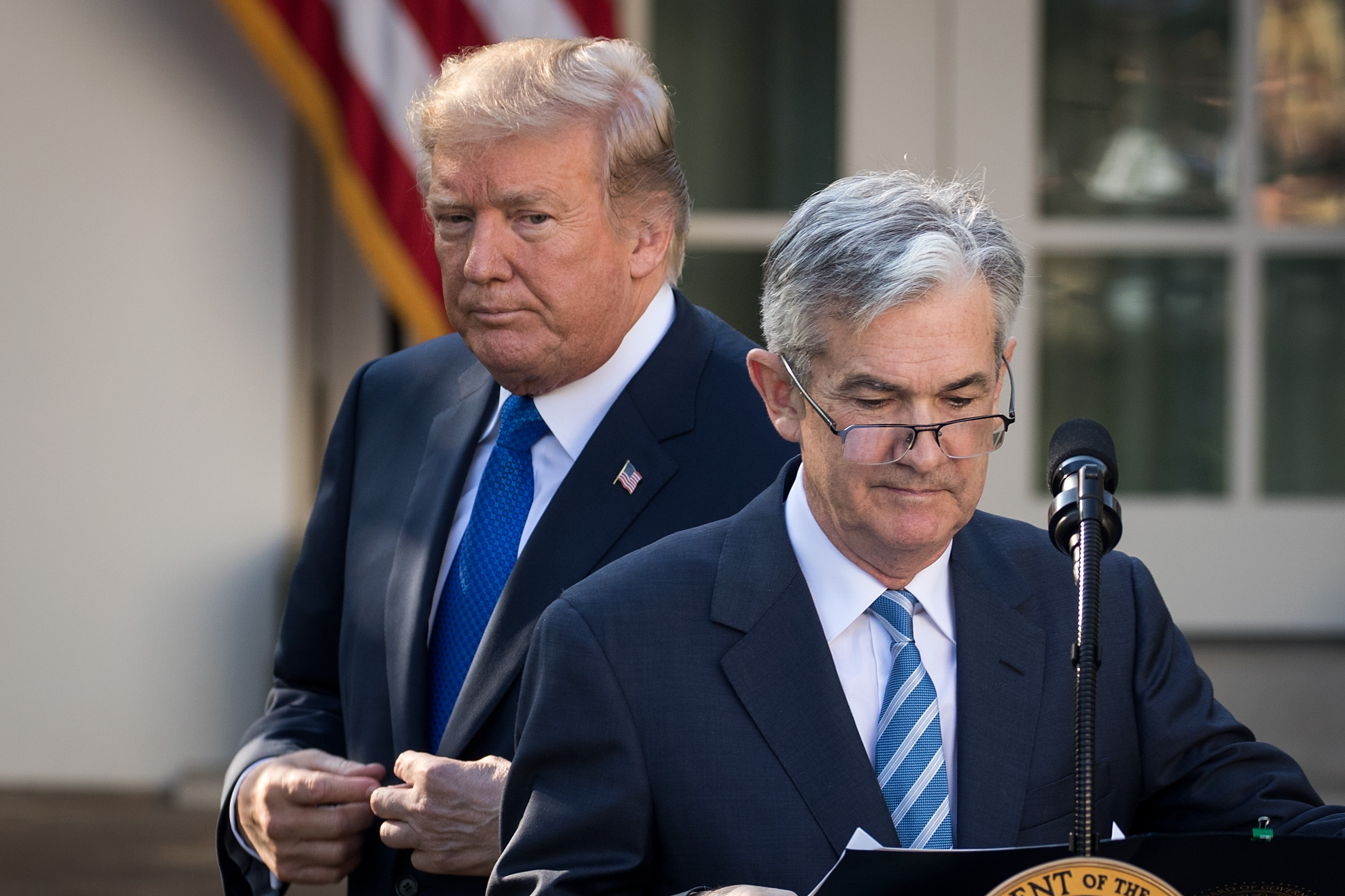 (L to R) U.S. President Donald Trump looks on as his nominee for the chairman of the Federal Reserve Jerome Powell takes to the podium during a press event in the Rose Garden at the White House, November 2, 2017 in Washington, DC. Photo by Drew Angerer/Getty Images