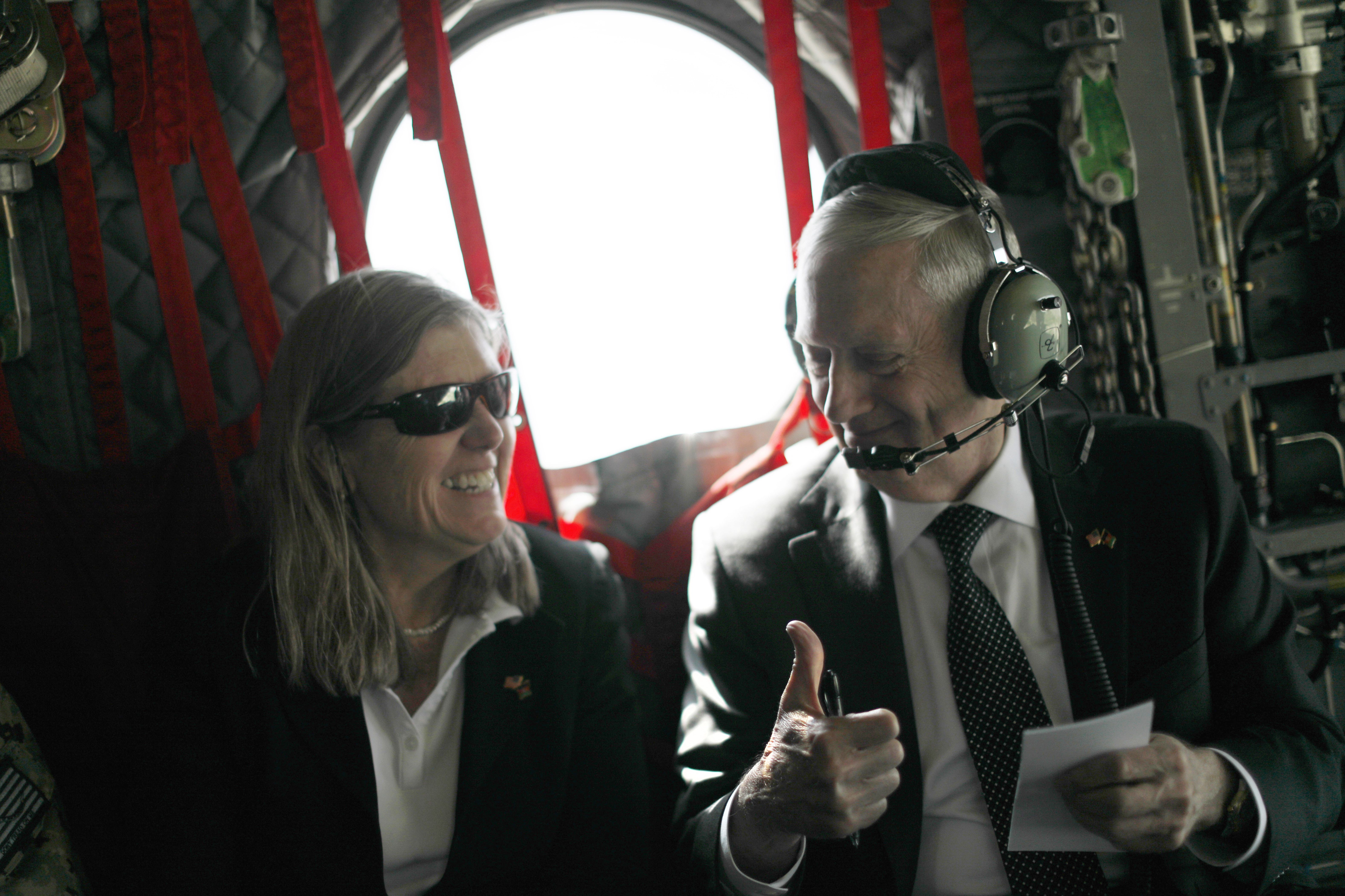US Defence Secretary James Mattis (R) gestures to senior advisor Sally Donnelly as they arrive by helicopter at Resolute Support headquarters in the Afghan capital Kabul on April 24, 2017.