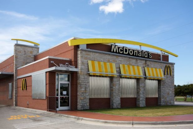 A McDonald's fast food restaurant is fitted with corrugated metal shutters as it sits empty in Cedar Point, North Carolina on September 12, 2018 in advance of Hurricane Florence. (LOGAN CYRUS/AFP/Getty Images)