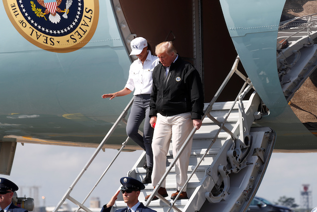 U.S. President Donald Trump steps off Air Force One as the president arrives to tour storm damage from Hurricane Michael at Eglin Air Force Base, Florida, U.S., October 15, 2018. REUTERS/Kevin Lamarque