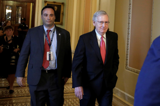Senate Majority Leader Mitch McConnell (R) walks on Capitol Hill in Washington, October 5, 2018. REUTERS/Yuri Gripas
