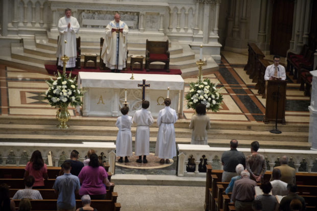 Comprehensive Investigation Into Pennsylvania's Catholic Church Reveals Massive Sex Abuse Scandal And Coverups. Parishioners worship during a mass to celebrate the Assumption of the Blessed Virgin Mary at St Paul Cathedral, the mother church of the Pittsburgh Diocese on August 15, 2018 in Pittsburgh, Pennsylvania. The Pittsburgh Diocese was rocked by revelations of abuse by priests the day before on August 14, 2018.(Photo by Jeff Swensen/Getty Images)