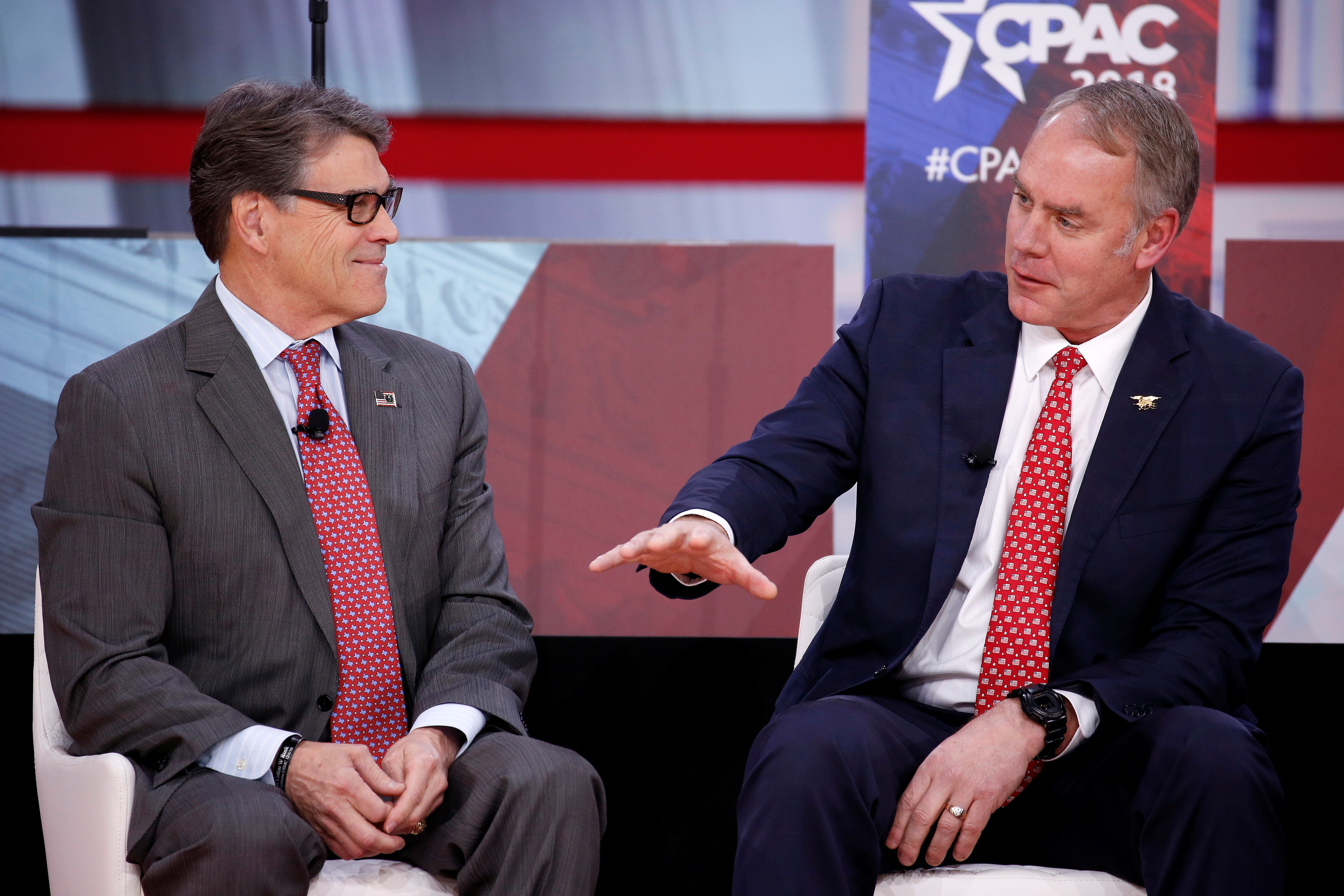 U.S. Secretary of Energy Rick Perry and U.S. Secretary of Interior Ryan Zinke speak at the Conservative Political Action Conference (CPAC) at National Harbor, Maryland