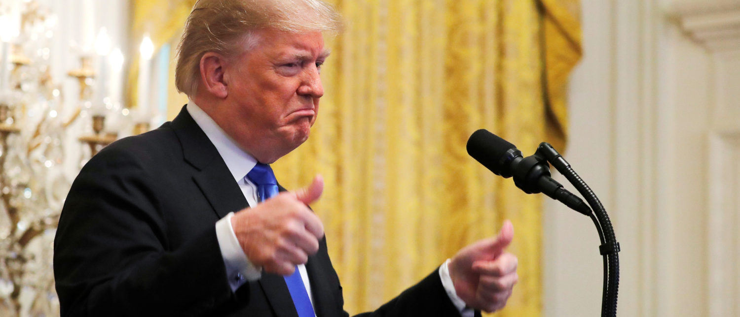 U.S. President Donald Trump gives two thumbs up as he talks about the arrest of a bombing suspect sought in connection with packages sent to Democratic political figures and critics of the president during an event in the East Room of the White House in Washington, U.S., October 26, 2018. REUTERS/Carlos Barria