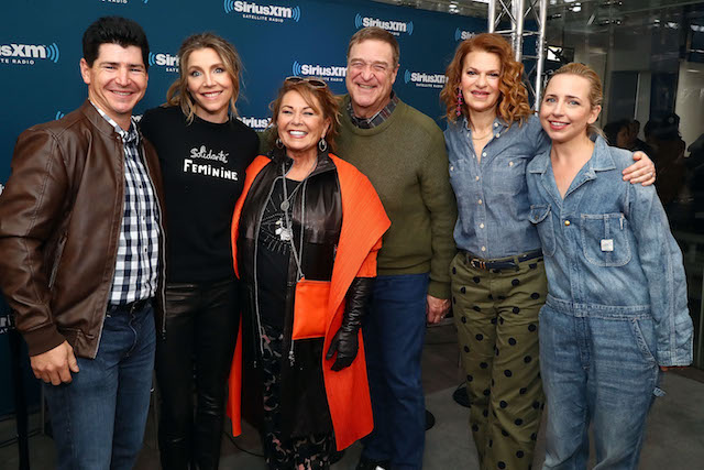 Actors Michael Fishman, Sarah Chalke, Roseanne Barr, John Goodman, SiriusXM host Sandra Bernhard and Lecy Goranson pose for photos during SiriusXM's Town Hall with the cast of Roseanne on March 27, 2018 in New York City. (Photo by Astrid Stawiarz/Getty Images for SiriusXM)