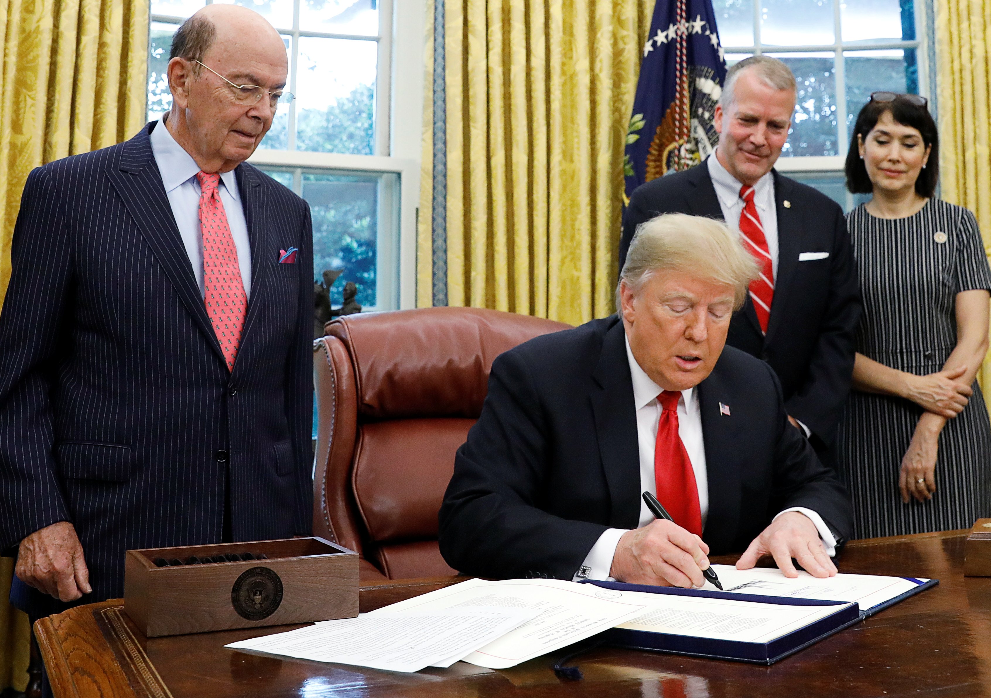 U.S. President Donald Trump participates in "Save Our Seas Act of 2018" signing ceremony at the White House in Washington