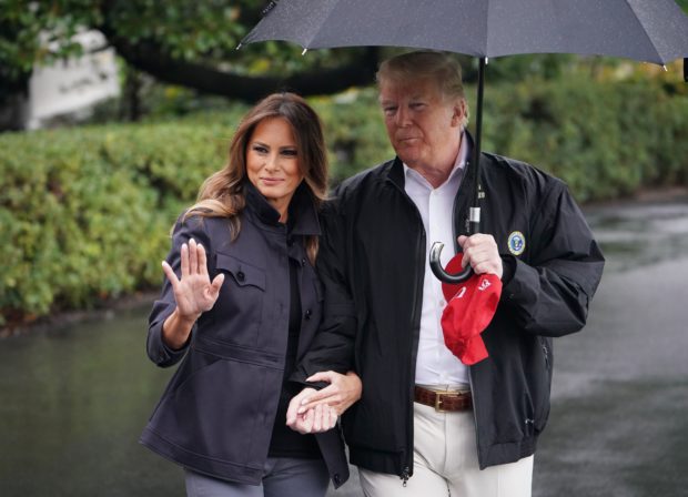 US President Donald Trump and First Lady Melania Trump make their way to board Marine One from the South Lawn of the White House in Washington, DC on October 15, 2018. - (Photo by MANDEL NGAN / AFP/Getty Images)