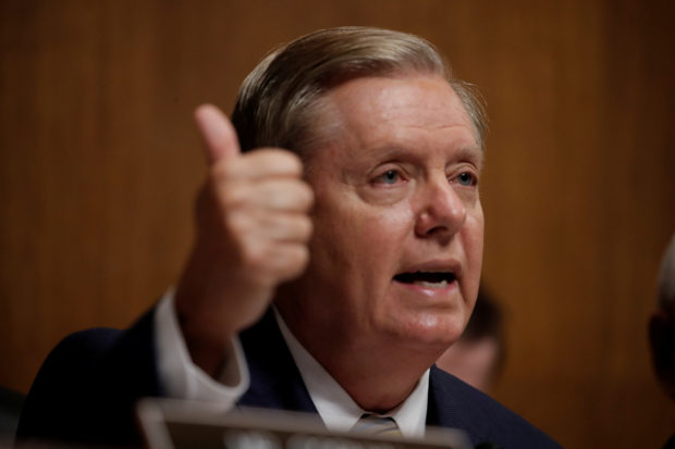 U.S. Senator Lindsey Graham (R-SC) speaks as members of the Senate Judiciary Committee meet to vote on the nomination of judge Brett Kavanaugh to be a U.S. Supreme Court associate justice on Capitol Hill in Washington, U.S., September 28, 2018. REUTERS/Jim Bourg