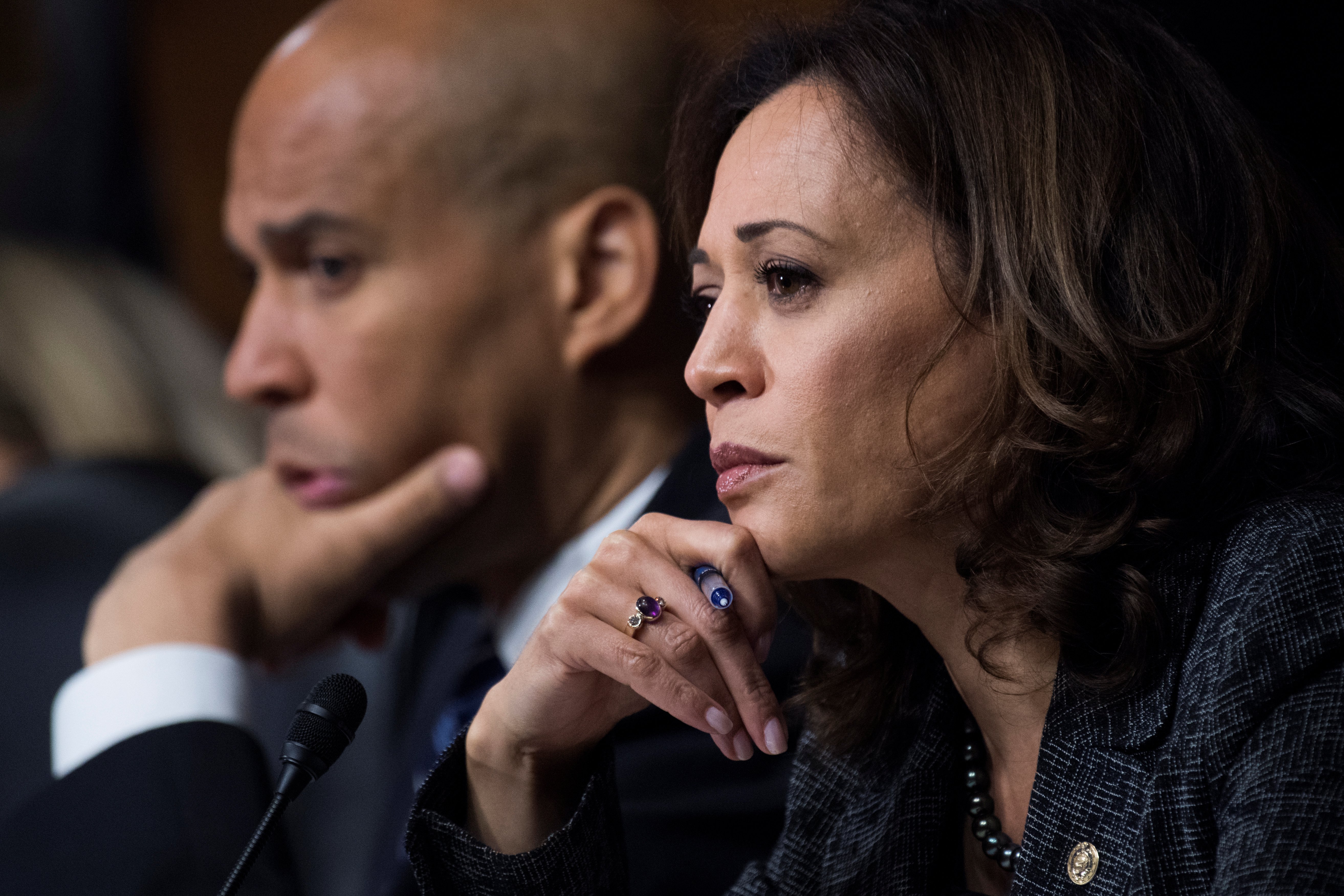 Sen. Cory Booker, D-N.J., and Sen. Kamala Harris, D-Calif., listen as Dr. Christine Blasey Ford testifies during the Senate Judiciary Committee hearing on the nomination of Brett M. Kavanaugh to be an associate justice of the Supreme Court of the United States, focusing on allegations of sexual assault by Kavanaugh against Christine Blasey Ford in the early 1980s, in Washington, DC, U.S., September 27, 2018. Picture taken September 27, 2018. Tom Williams/Pool