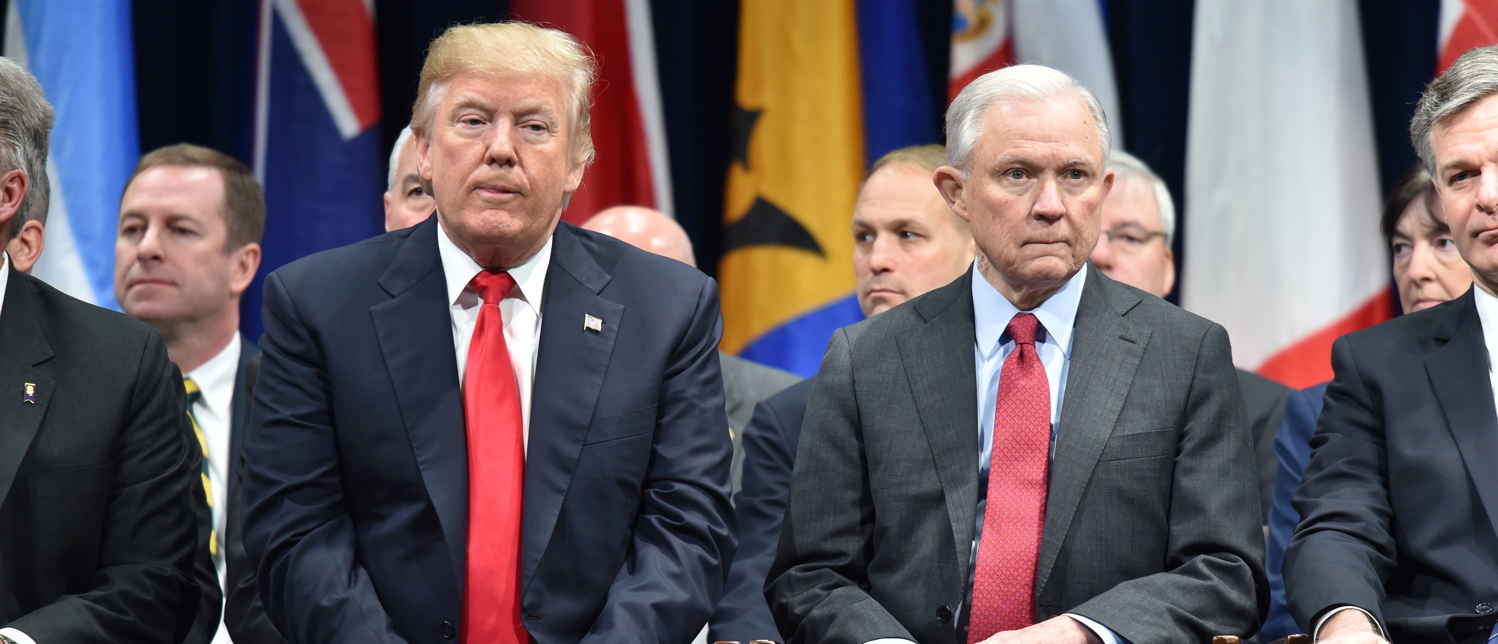 President Donald Trump sits with Attorney General Jeff Sessions on December 15, 2017 in Quantico, Virginia, before participating in the FBI National Academy graduation ceremony. (Photo: NICHOLAS KAMM/AFP/Getty Images)