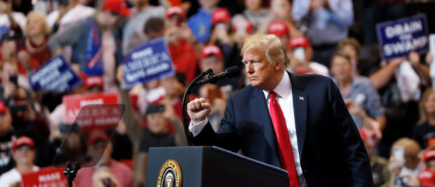 U.S. President Donald Trump acknowledges supporters during a campaign rally in Cleveland, Ohio., U.S., November 5, 2018. REUTERS/Carlos Barria