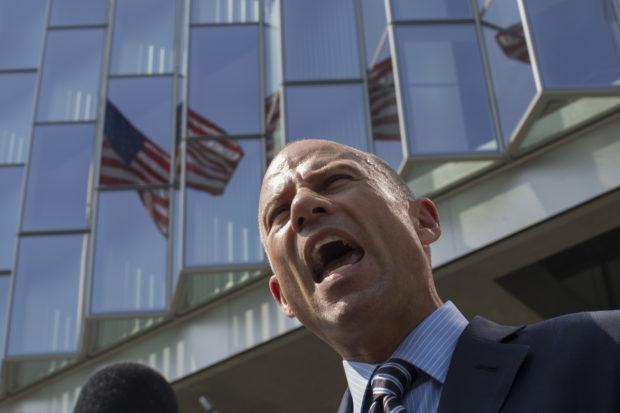 LOS ANGELES, CA - JULY 27: Attorney Michael Avenatti, who represents adult film actress Stormy Daniels, speaks to reporters during a break in a motions hearing on July 27, 2018 in Los Angeles, California. Daniels, whose real name is Stephanie Clifford, is suing President Donald Trump and his former personal attorney, Michael Cohen, claiming that she was defamed and campaign finance law was violated by brokering a non-disclosure pact just before the 2016 presidential election. Avenatti maintains that the agreement is invalid because Trump did not sign it. (Photo by David McNew/Getty Images)