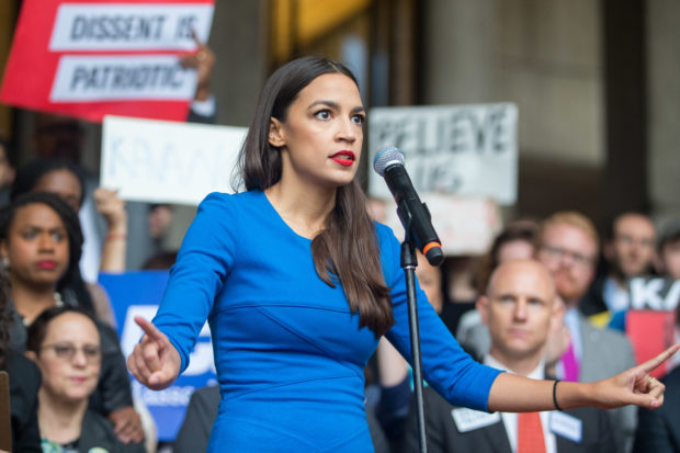 BOSTON, MA - OCTOBER 01: New York Democratic congressional candidate Alexandria Ocasio-Cortez speaks at a rally calling on Sen. Jeff Flake (R-AZ) to reject Judge Brett Kavanaugh's nomination to the Supreme Court on October 1, 2018 in Boston, Massachusetts. Sen. Flake is scheduled to give a talk at the Forbes 30 under 30 event in Boston after recently calling for a one week pause in the confirmation process to give the FBI more time to investigate sexual assault allegations. (Photo by Scott Eisen/Getty Images)