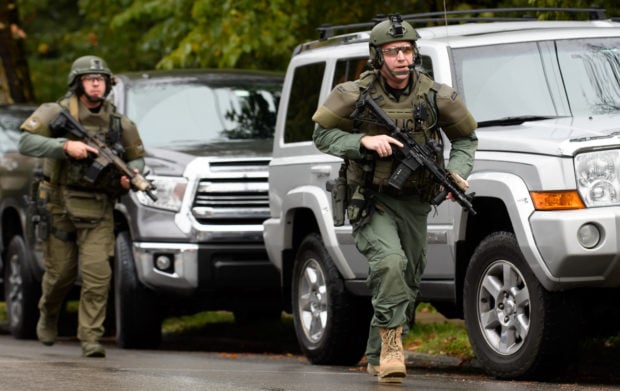 PITTSBURGH, PA - OCTOBER 27: Police rapid response team members respond to the site of a mass shooting at the Tree of Life Synagogue in the Squirrel Hill neighborhood on October 27, 2018 in Pittsburgh, Pennsylvania. According to reports, at least 12 people were shot, 4 dead and three police officers hurt during the incident. The shooter surrendered to authorities and was taken into custody. (Photo by Jeff Swensen/Getty Images)