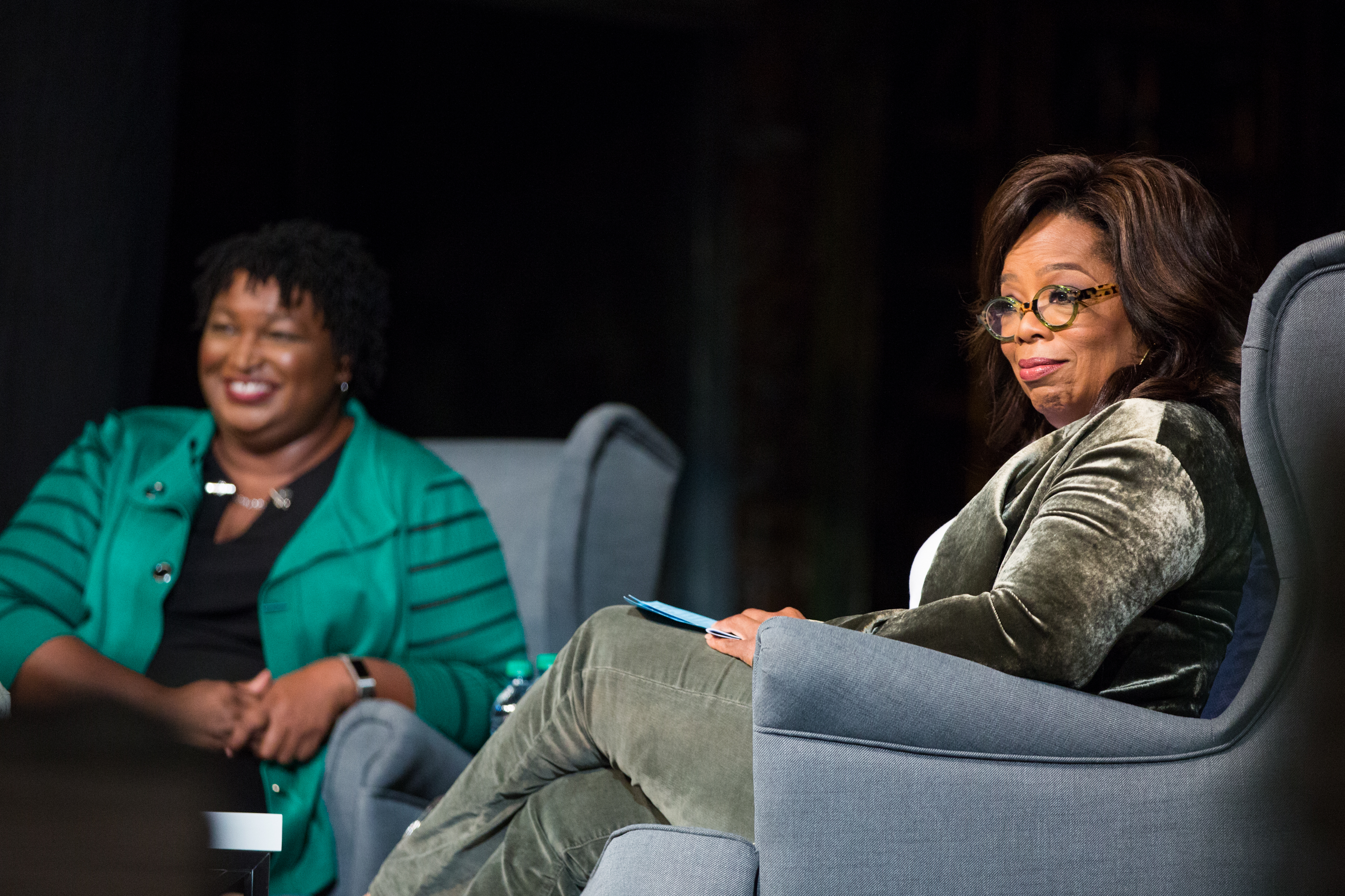 Oprah Winfrey interviews Georgia Democratic Gubernatorial candidate Stacey Abrams in front of an audience during a town hall style event at the Cobb Civic Center on November 1, 2018 in Marietta, Georgia. Jessica McGowan/Getty Images