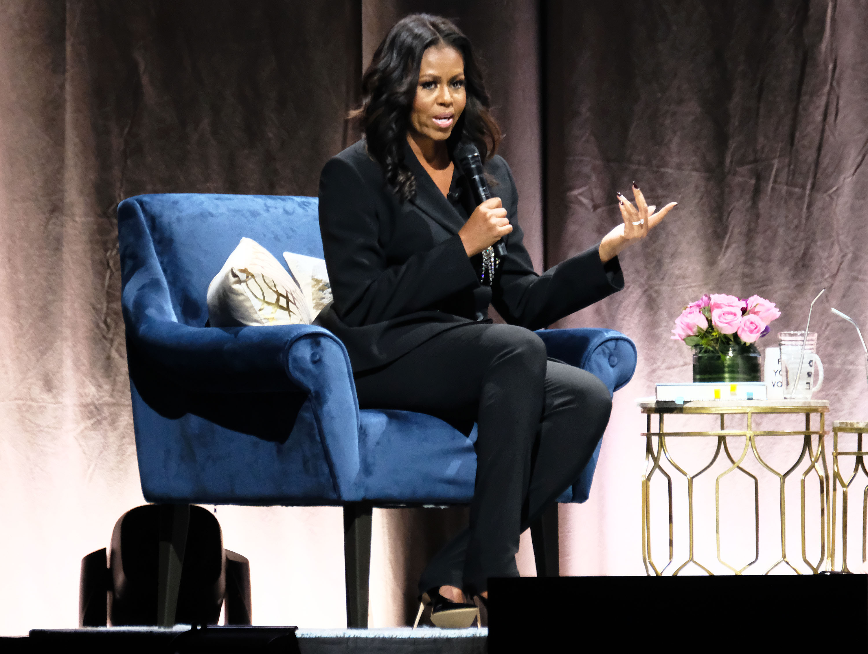 WASHINGTON, DC - NOVEMBER 17: Former First Lady Michelle Obama discusses her new book "Becoming" at Capital One Arena on November 17, 2018 in Washington, DC. (Photo by Paul Morigi/Getty Images)