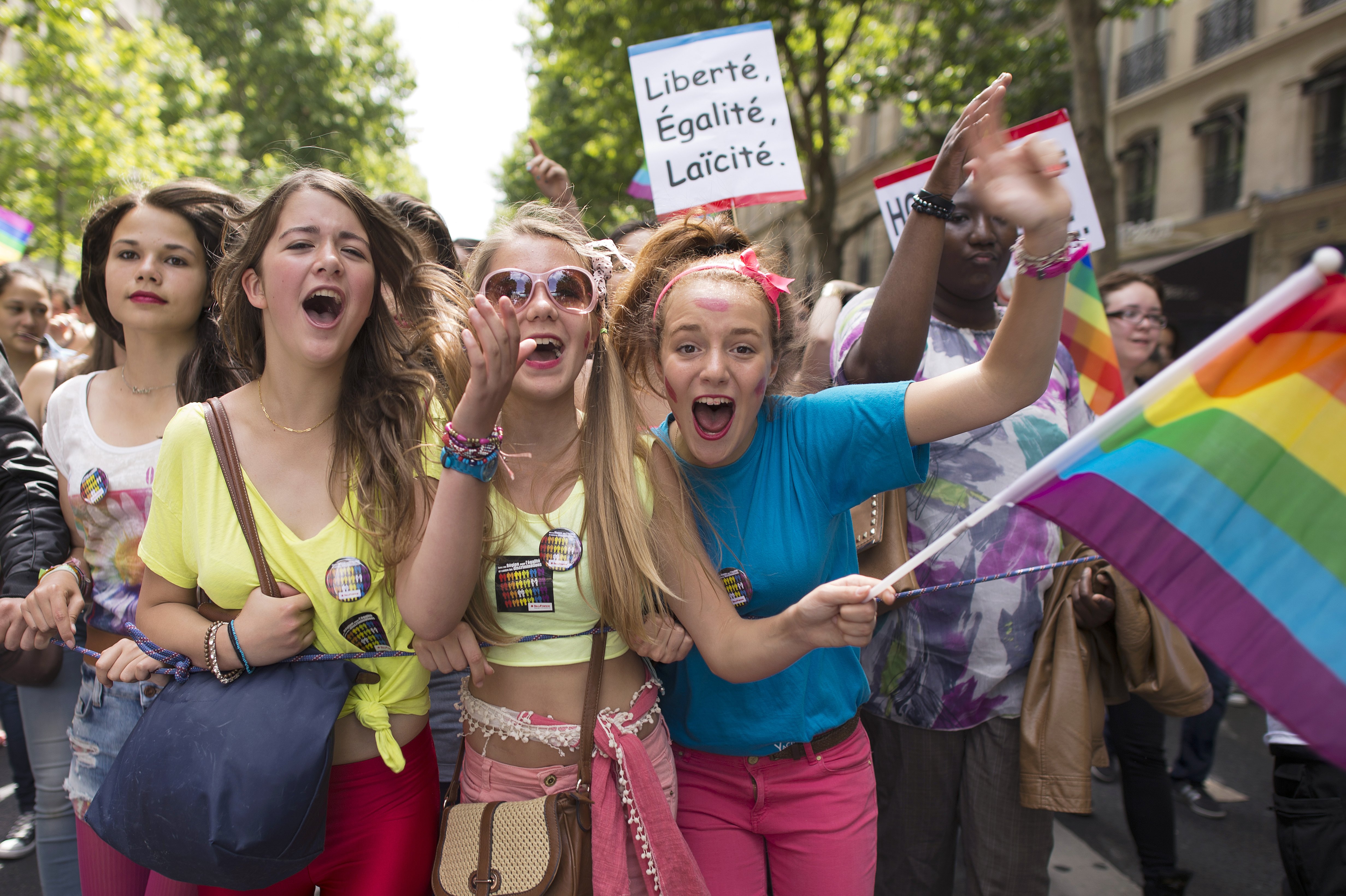 Girls parade during the homosexual, lesbian, bisexual and transgender (HLBT) visibility march, the Gay Pride, on June 29, 2013 in Paris. AFP PHOTO / LIONEL BONAVENTURE (Photo credit should read LIONEL BONAVENTURE/AFP/Getty Images)
