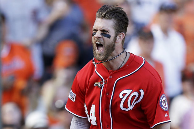 SAN FRANCISCO, CA - OCTOBER 06: Bryce Harper #34 of the Washington Nationals celebrates after scoring on a throwing error by Madison Bumgarner #40 of the San Francisco Giants in the seventh inning during Game Three of the National League Division Series at AT&T Park on October 6, 2014 in San Francisco, California. (Photo by Ezra Shaw/Getty Images)