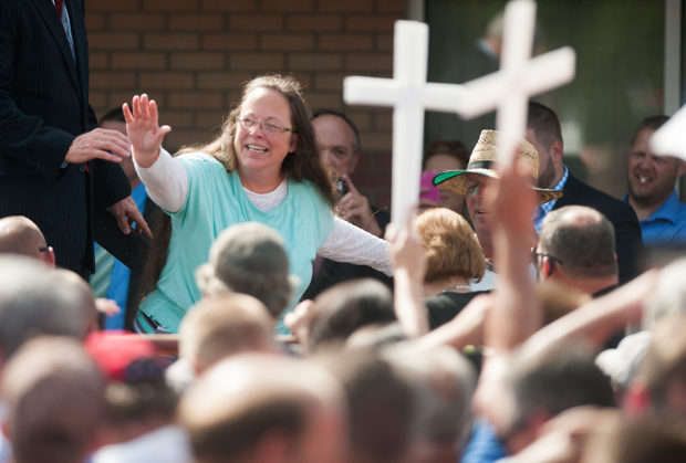 GRAYSON, KY - SEPTEMBER 8: Rowan County Clerk of Courts Kim Davis waves to a crowd of her supporters at a rally in front of the Carter County Detention Center on September 8, 2015 in Grayson, Kentucky. Davis was ordered to jail last week for contempt of court after refusing a court order to issue marriage licenses to same-sex couples. (Photo by Ty Wright/Getty Images)