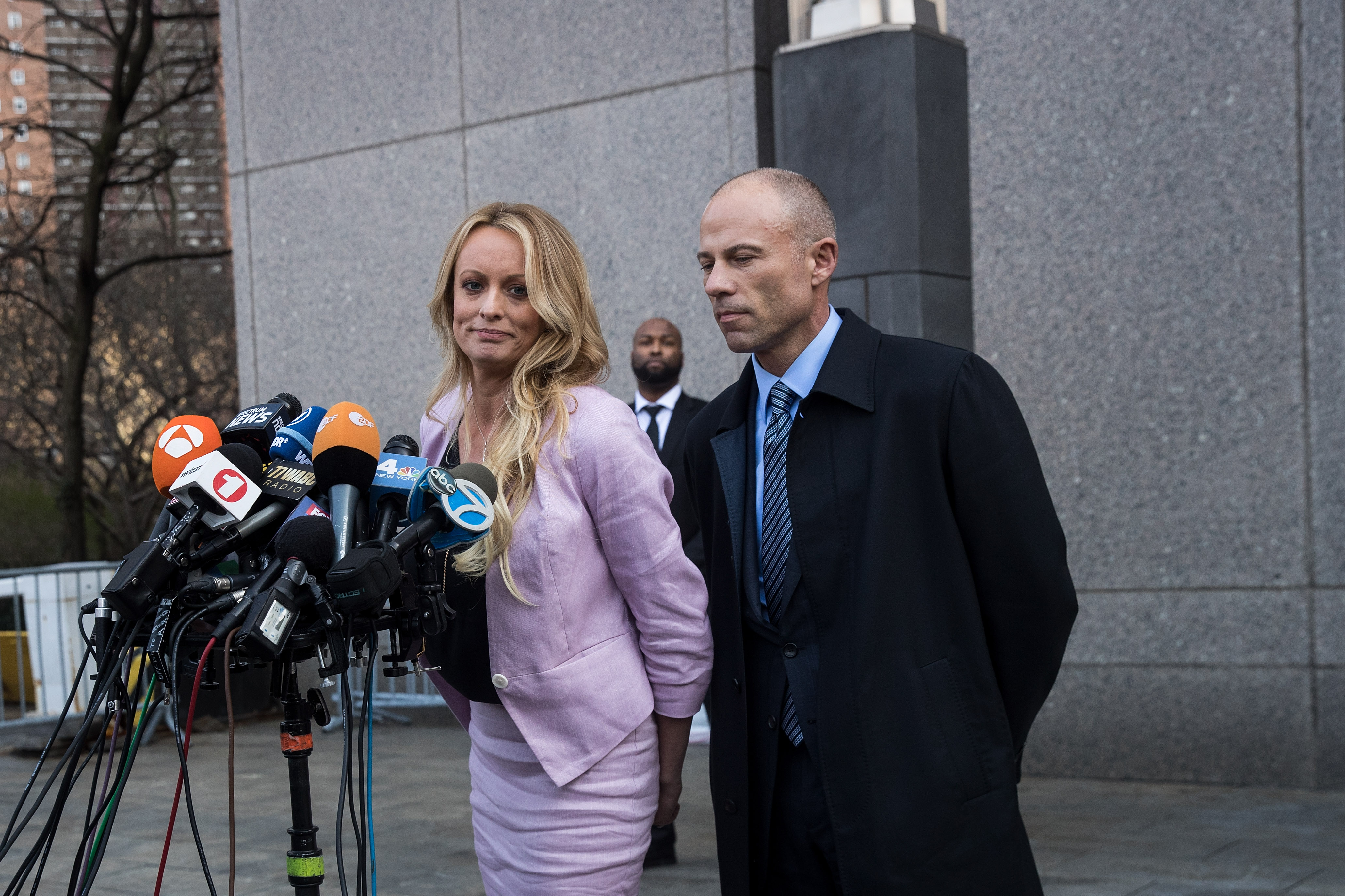 NEW YORK, NY - APRIL 16: (L to R) Adult film actress Stormy Daniels (Stephanie Clifford) and Michael Avenatti, attorney for Stormy Daniels, speak to the media as they exit the United States District Court Southern District of New York for a hearing related to Michael Cohen, President Trump's longtime personal attorney and confidante, April 16, 2018 in New York City. Cohen and lawyers representing President Trump are asking the court to block Justice Department officials from reading documents and materials related to Cohen's relationship with President Trump that they believe should be protected by attorney-client privilege. Officials with the FBI, armed with a search warrant, raided Cohen's office and two private residences last week. (Photo by Drew Angerer/Getty Images)