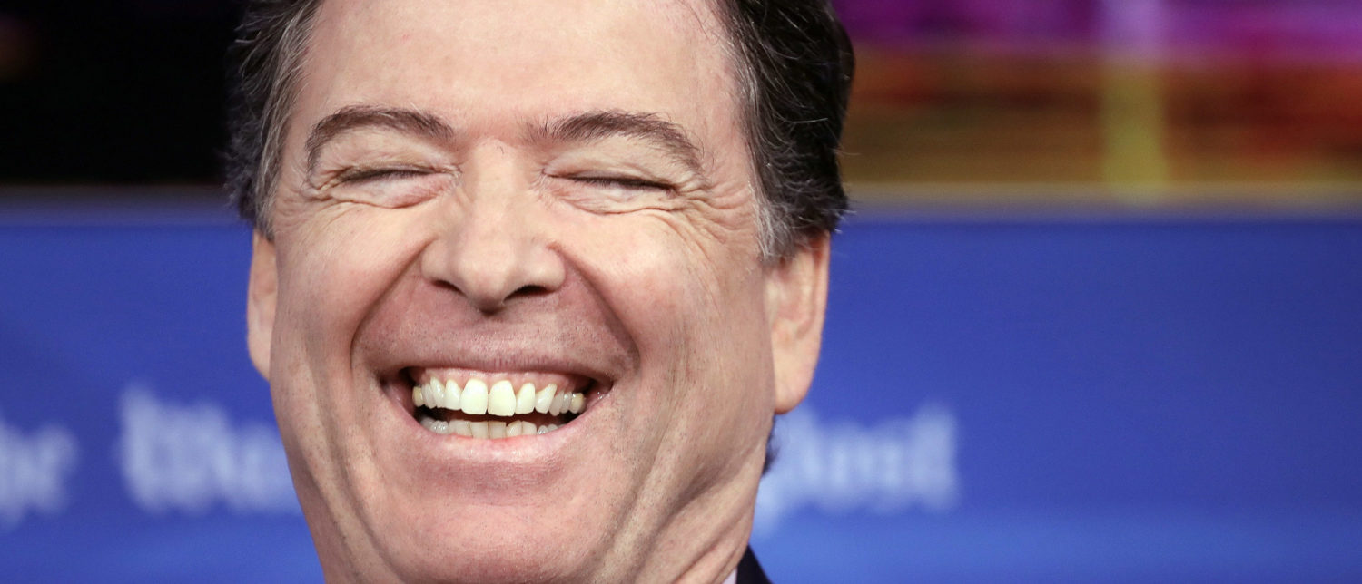 WASHINGTON, DC - MAY 07: Former FBI director James Comey laughs while answering questions during an interview forum at the Washington Post May 8, 2018 in Washington, DC. Comey discussed his stormy tenure as head of the FBI, his handling of the Hillary Clinton email investigation, his tense relationship with President Trump and his controversial firing a year ago, during the forum. (Photo by Win McNamee/Getty Images)