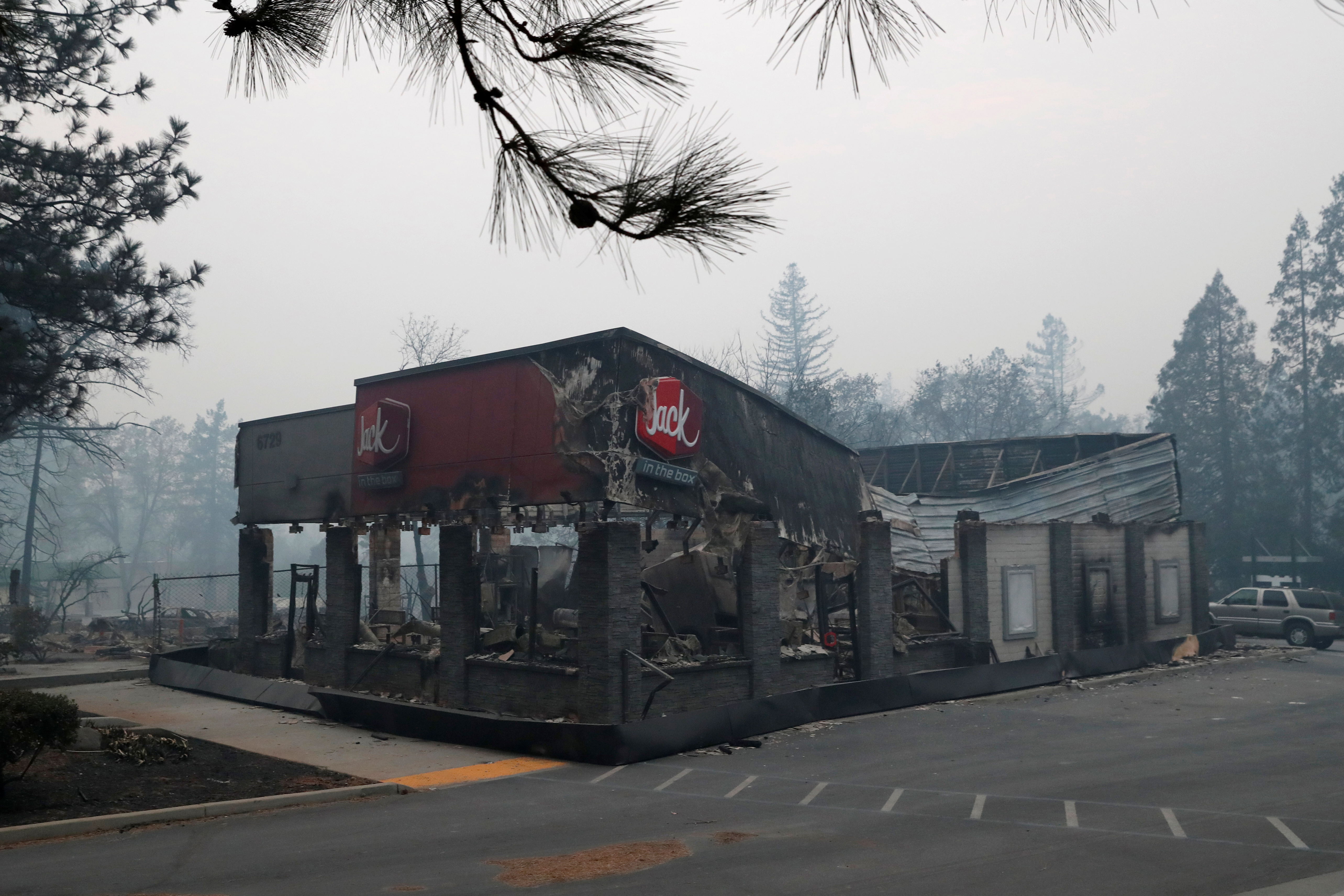 A Jack In The Box restaurant damaged by the Camp Fire is seen in Paradise, California, U.S., November 13, 2018. REUTERS/Terray Sylvester