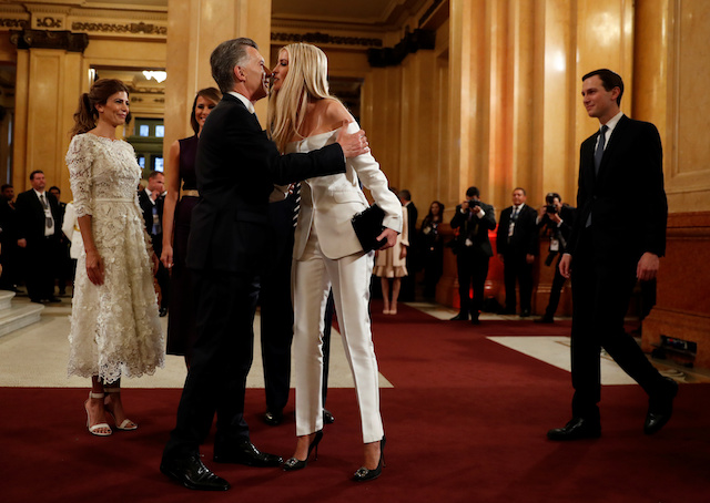 U.S. President Donald Trump and U.S. first lady Melania Trump, along with White House advisors Jared Kushner and Ivanka Trump are welcomed by Argentina's President Mauricio Macri and his spouse Juliana Awada upon arriving at the Colon Theatre for a gala in Buenos Aires, Argentina November 30, 2018. REUTERS/Kevin Lamarque