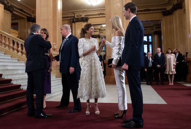 US President Donald Trump (C) and her wife US First Lady Melania Trump (2-L), talk to Argentina's President Mauricio Macri (L), while Argentina's First Lady Juliana Awada speaks with White House adviser and US President daughter Ivanka Trump and her husband Trump's Senior Advisor Jared Kushner, prior to a gala at the Colon Theater in Buenos Aires, on November 30, 2018 in the sidelines of the G20 Leader's Summit. (Photo credit: SAUL LOEB/AFP/Getty Images)