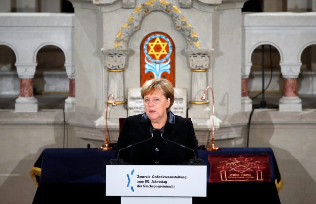 German Chancellor Angela Merkel speaks during a ceremony to mark the 80th anniversary of Kristallnacht, also known as Night of Broken Glass, at Rykestrasse Synagogue, in Berlin, Germany, November 9, 2018. REUTERS/Axel Schmidt
