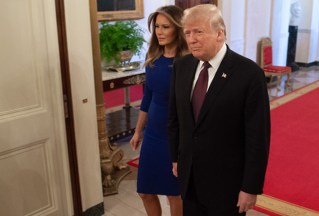 US President Donald Trump and First Lady Melania Trump arrive to award the Presidential Medal of Freedom during a ceremony in the East Room of the White House in Washington, DC, November 16, 2018. - The Medal is the highest civilian award of the United States. (Photo credit: SAUL LOEB/AFP/Getty Images)