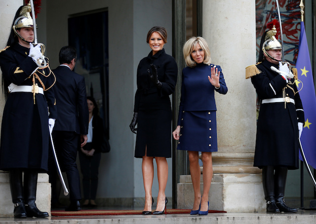 Brigitte Macron, wife of French President Emmanuel Macron, greets U.S. first lady Melania Trump at the Elysee Palace on the eve of the commemoration ceremony for Armistice Day, 100 years after the end of the First World War, in Paris, France, November 10, 2018. REUTERS/Vincent Kessler 